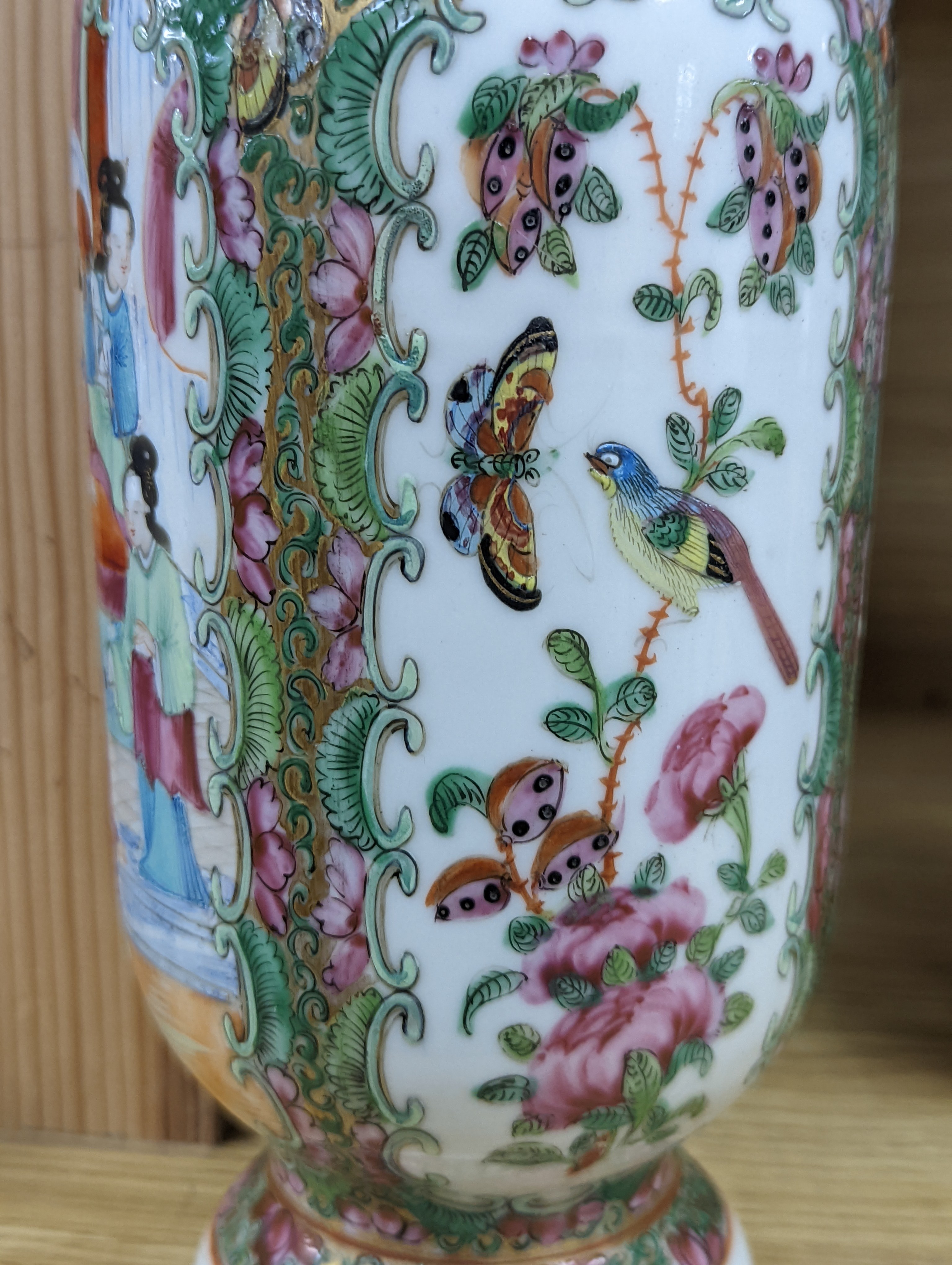 Two Chinese famille rose vases, late 19th century, tallest 26 cm, one wood stand, some restoration